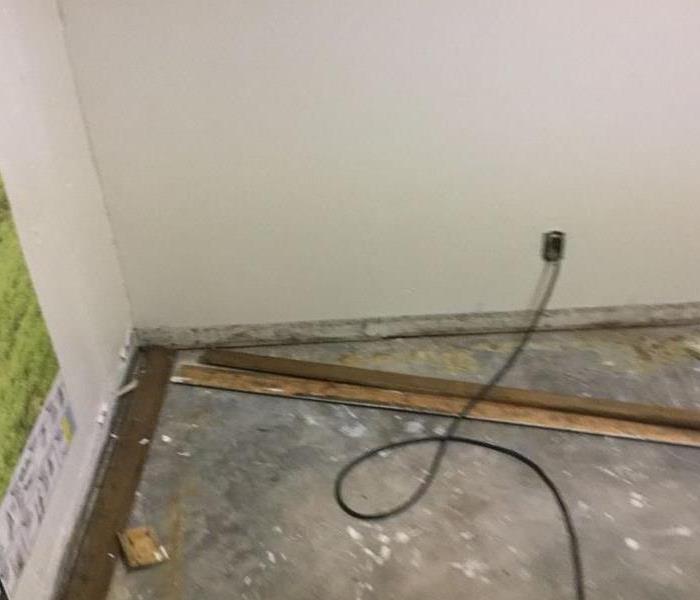 Wall and floor before flood cut